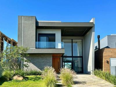 Casa em Condomínio 4 dormitórios para venda, CAPÃO ILHAS RESORT em Capão da Canoa | Ref.: 3255